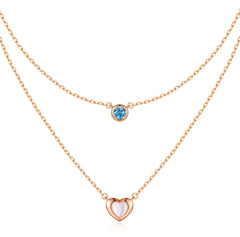 Double necklace with heart and blue crystal 
