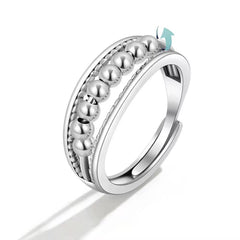 Anillo de bolitas anti-estrés plateado