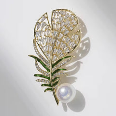 Broche de hoja con perla