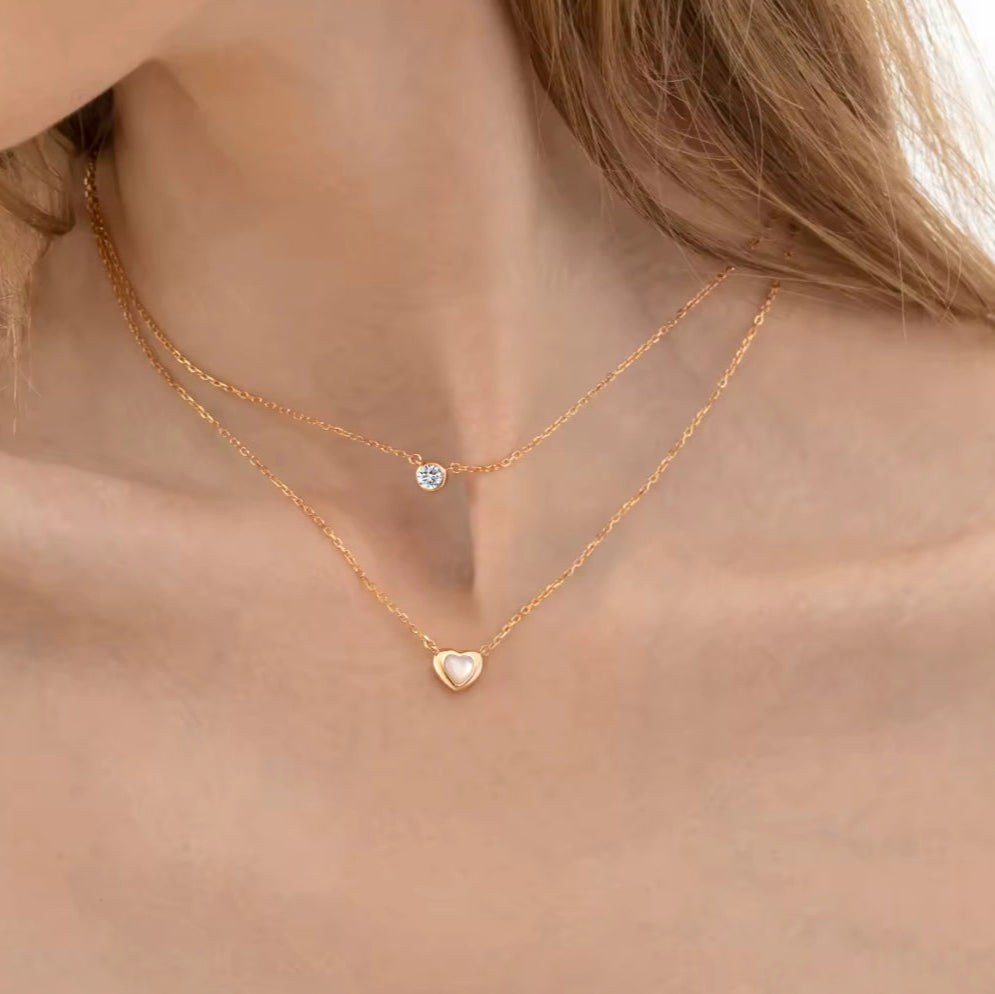 Collar doble con corazón y cristal azul
