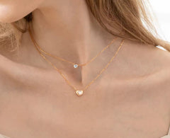 Double necklace with heart and blue crystal 