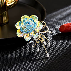 Broche de Flor con cristales tornasol