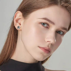 Aretes stud de balón de fútbol con Moissanitas negras