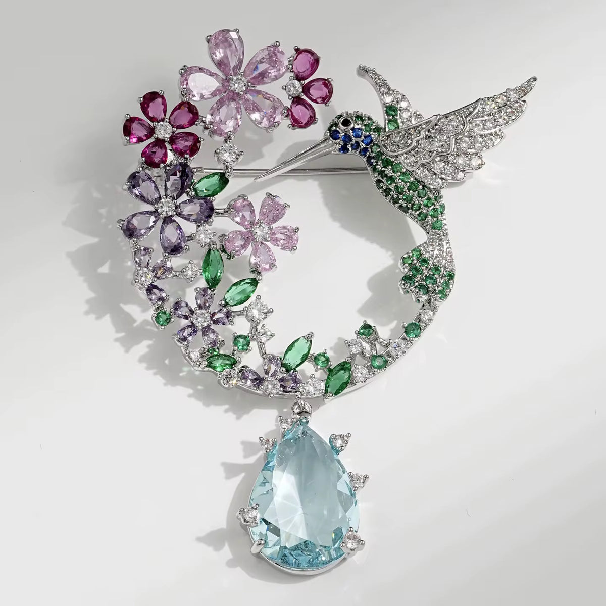 Broche de Colibrí con flores