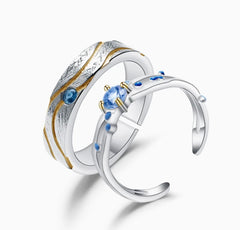 Couple rings Sun and Sea rays 