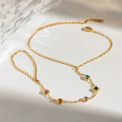 Pulsera con anillo de cristales de colores
