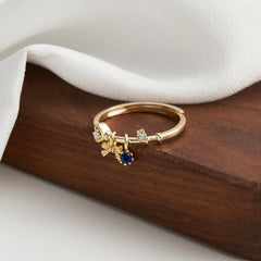 Anillo Lazo Coquette con Zafiro - dorado