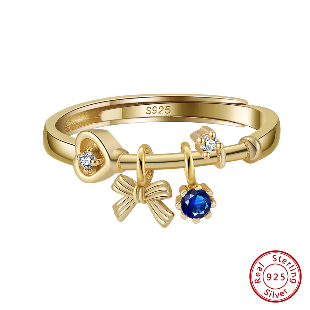 Anillo Lazo Coquette con Zafiro - dorado